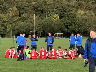 Coach Lee Kendall with USW Men's 1sts