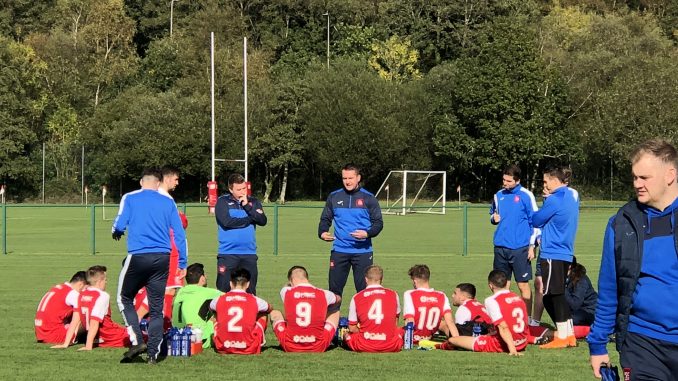 Coach Lee Kendall with USW Men's 1sts